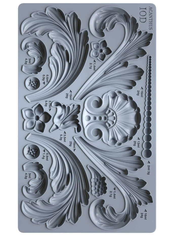 Decorative silicone mold with intricate designs and measurements on a gray background