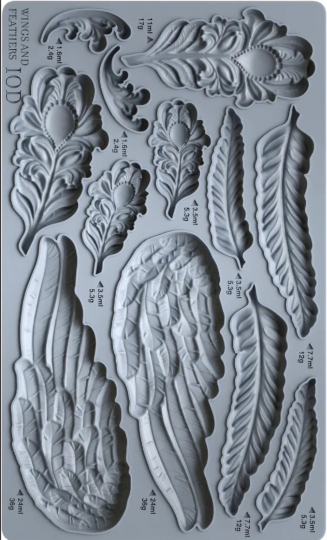 Mold with feather and wing designs on a gray background