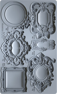 Decorative frame silicone mold with intricate designs on a gray background