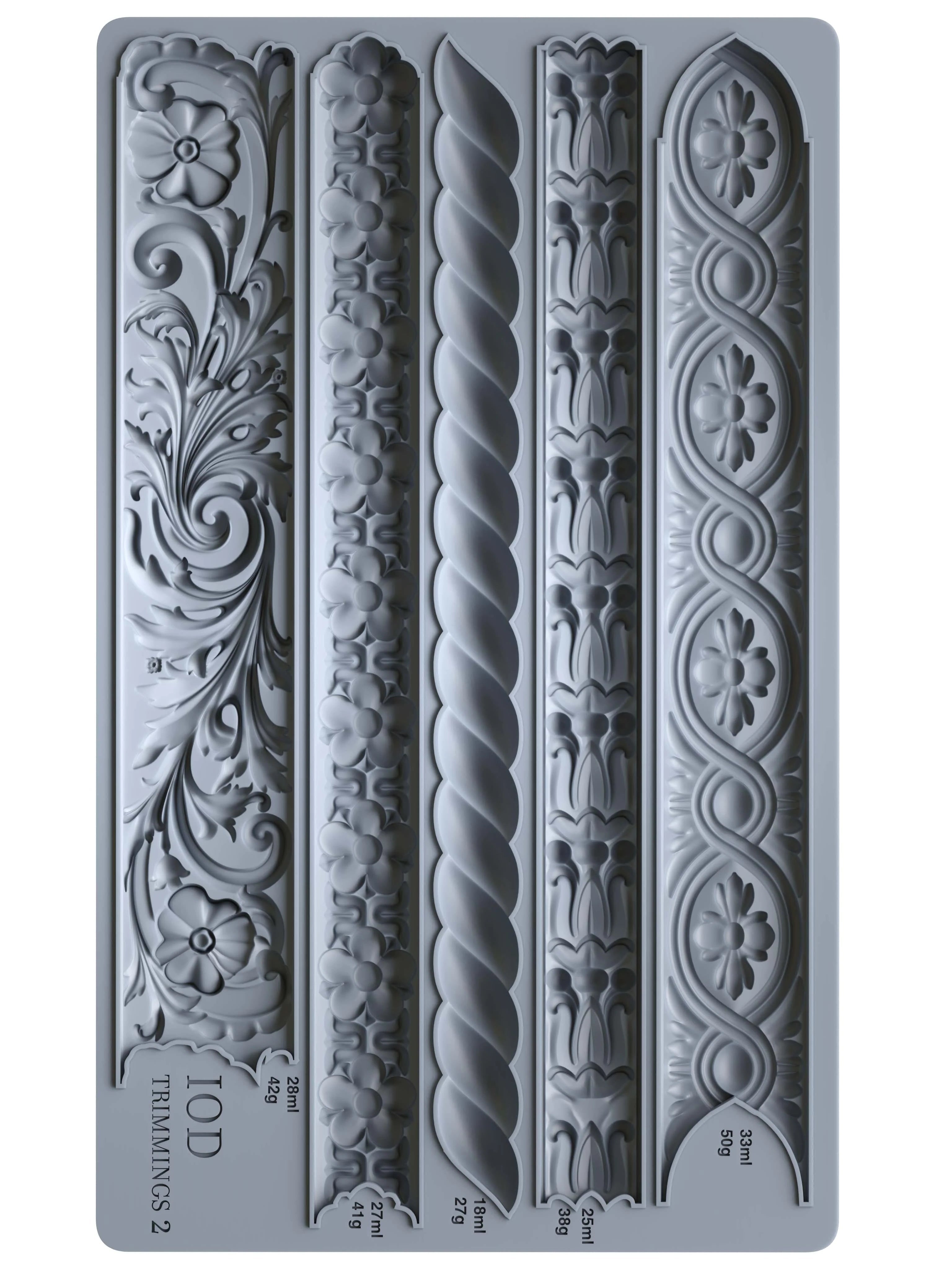 Decorative mold with intricate patterns on a gray background