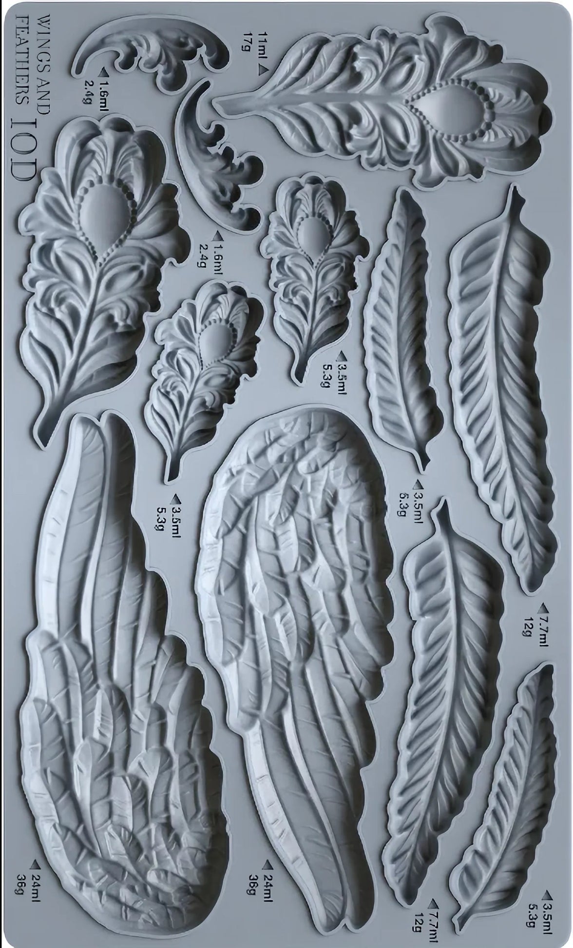 Mold with feather and wing designs on a gray background
