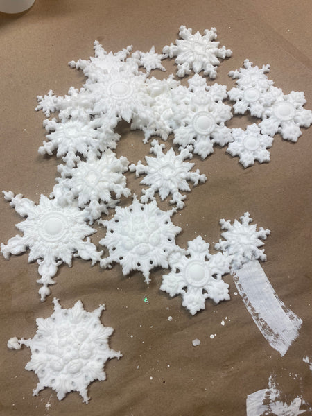 One set of ten Snowflake Castings